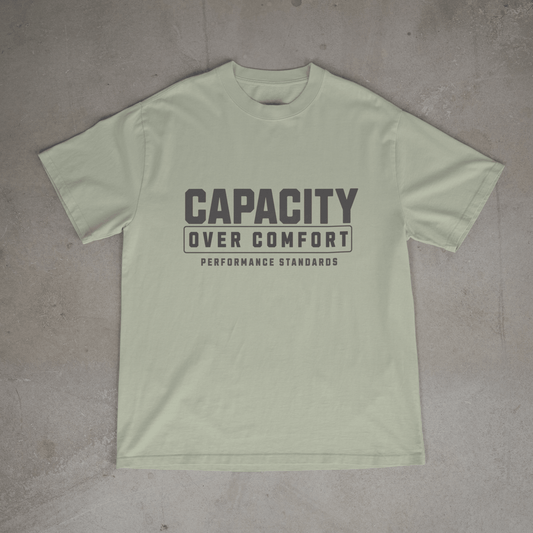 Light green mens  gym t shirt with 'Capacity Over Comfort' text on chest