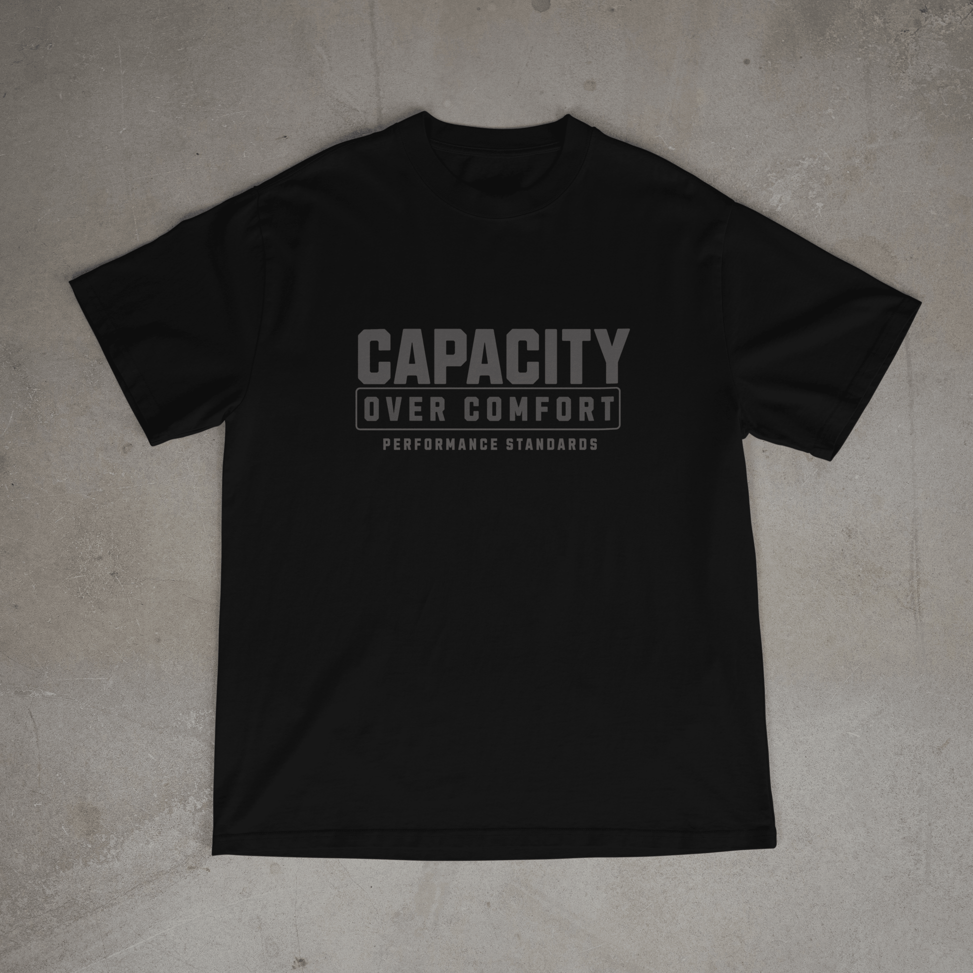 Black mens  gym t shirt with 'Capacity Over Comfort' text on chest